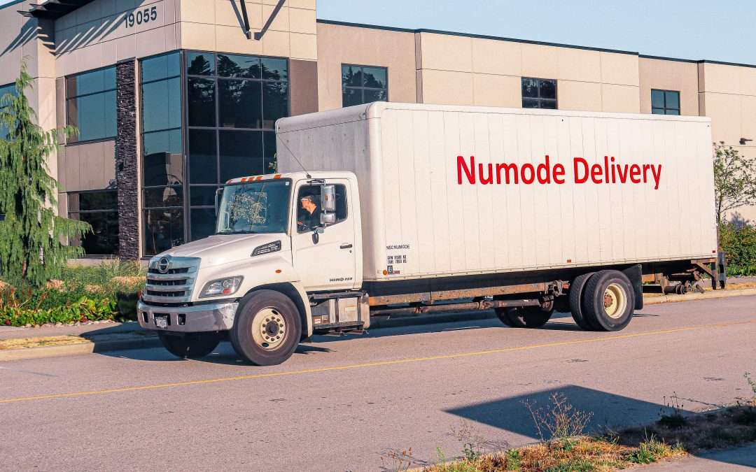 numode delivery solutions white truck