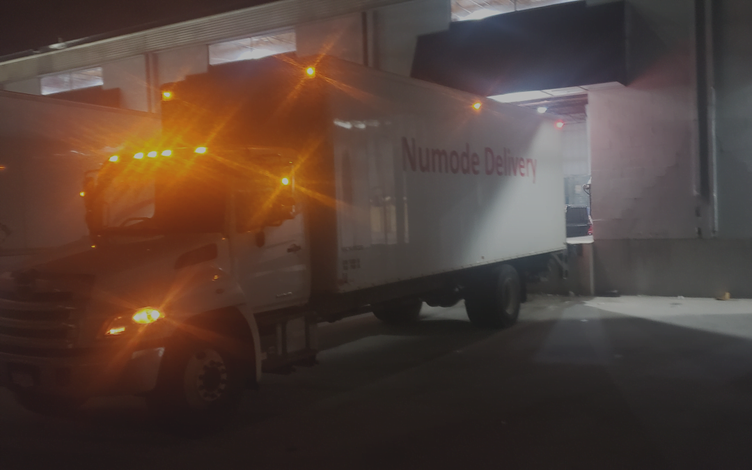 Numode truck getting loaded for nighttime deliveries