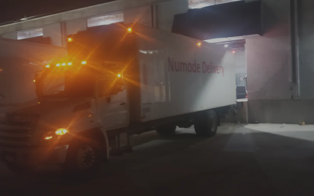 Numode truck getting loaded for nighttime deliveries