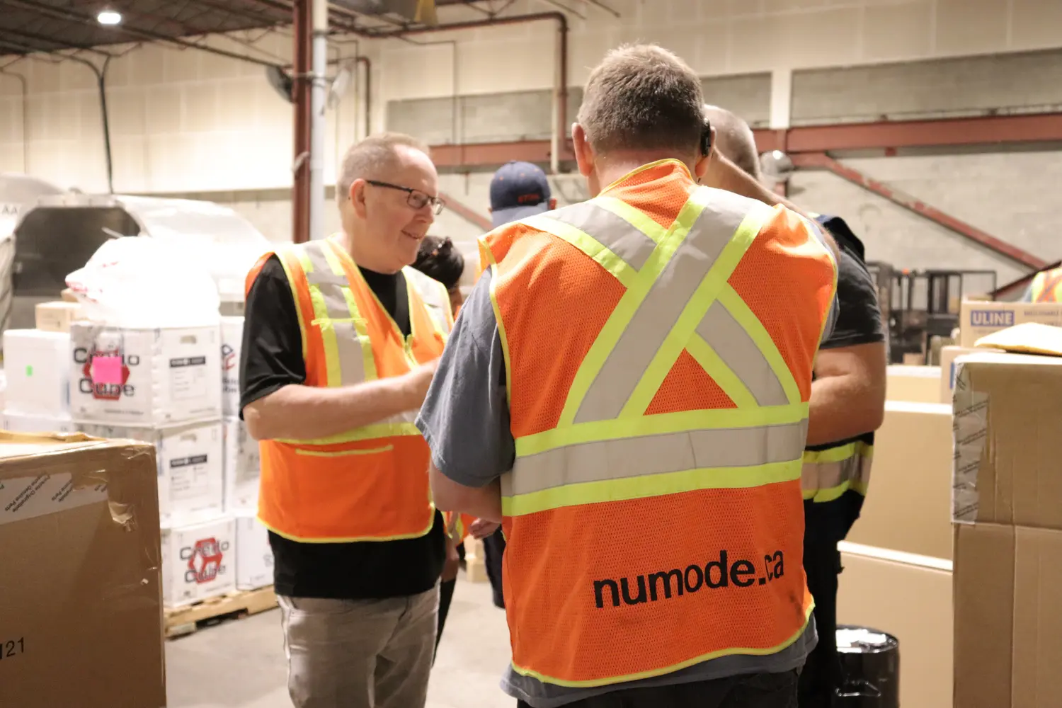 Numode employees planning the route for dedicated services in our warehouse